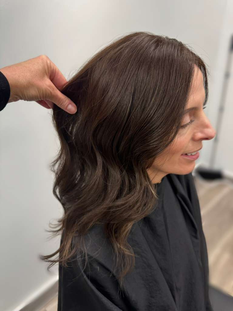 Client with restored full density after hair restoration